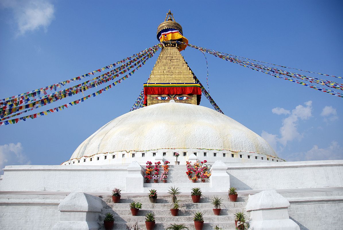 Kathmandu Boudhanath 13-2 Boudhanath Stupa Entrance Steps Are Blocked By Flowers 